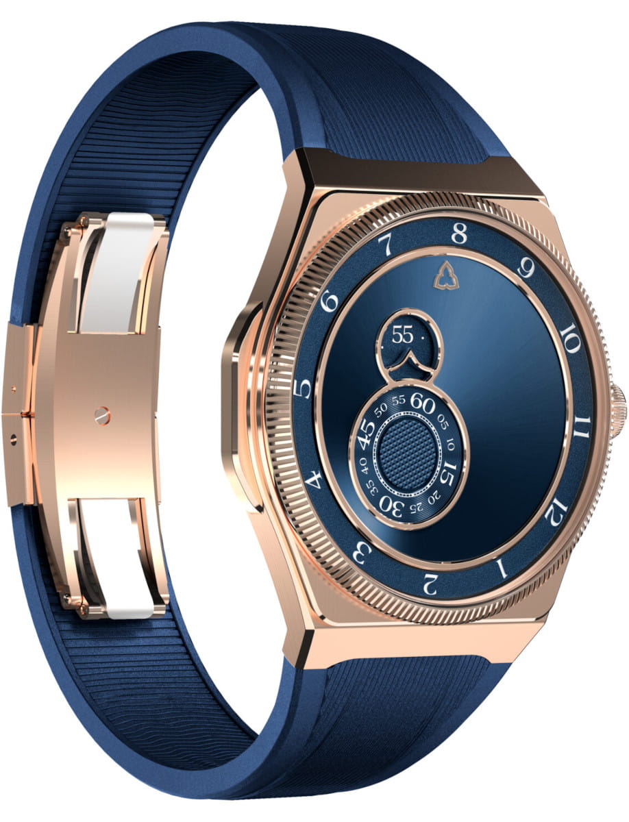 Rose gold wristwatch with a blue dial and blue strap, featuring a textured inner ring and multiple circular indicators.