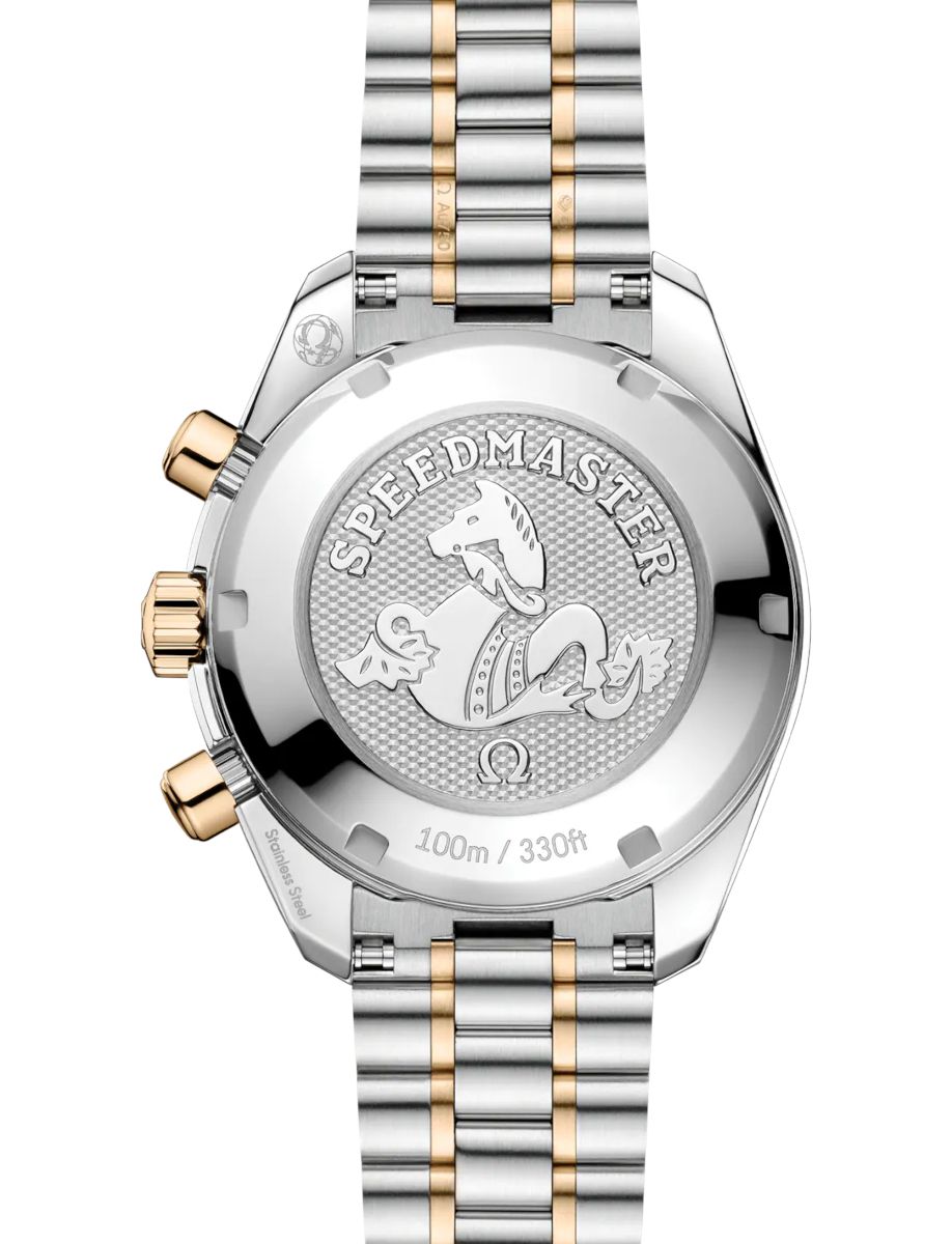 Omega Speedmaster caseback featuring the seahorse crest and SPEEDMASTER engraving, two-tone silver and gold bracelet visible.