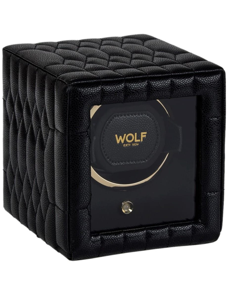 Black quilted leather watch winder cube with a glass front revealing the Wolf branding and inner mechanism.
