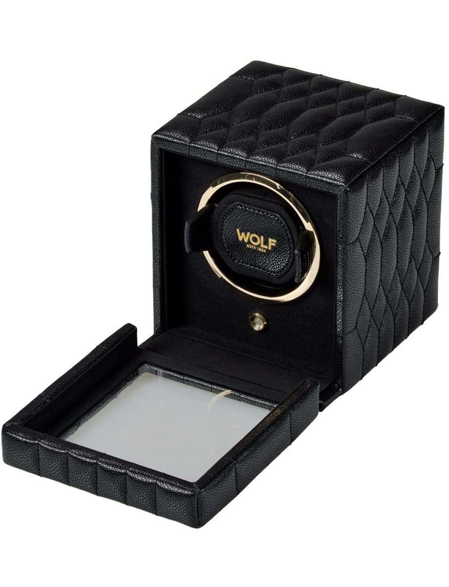 Black quilted leather watch winder with a gold circular holder and a pull-out mirrored tray.