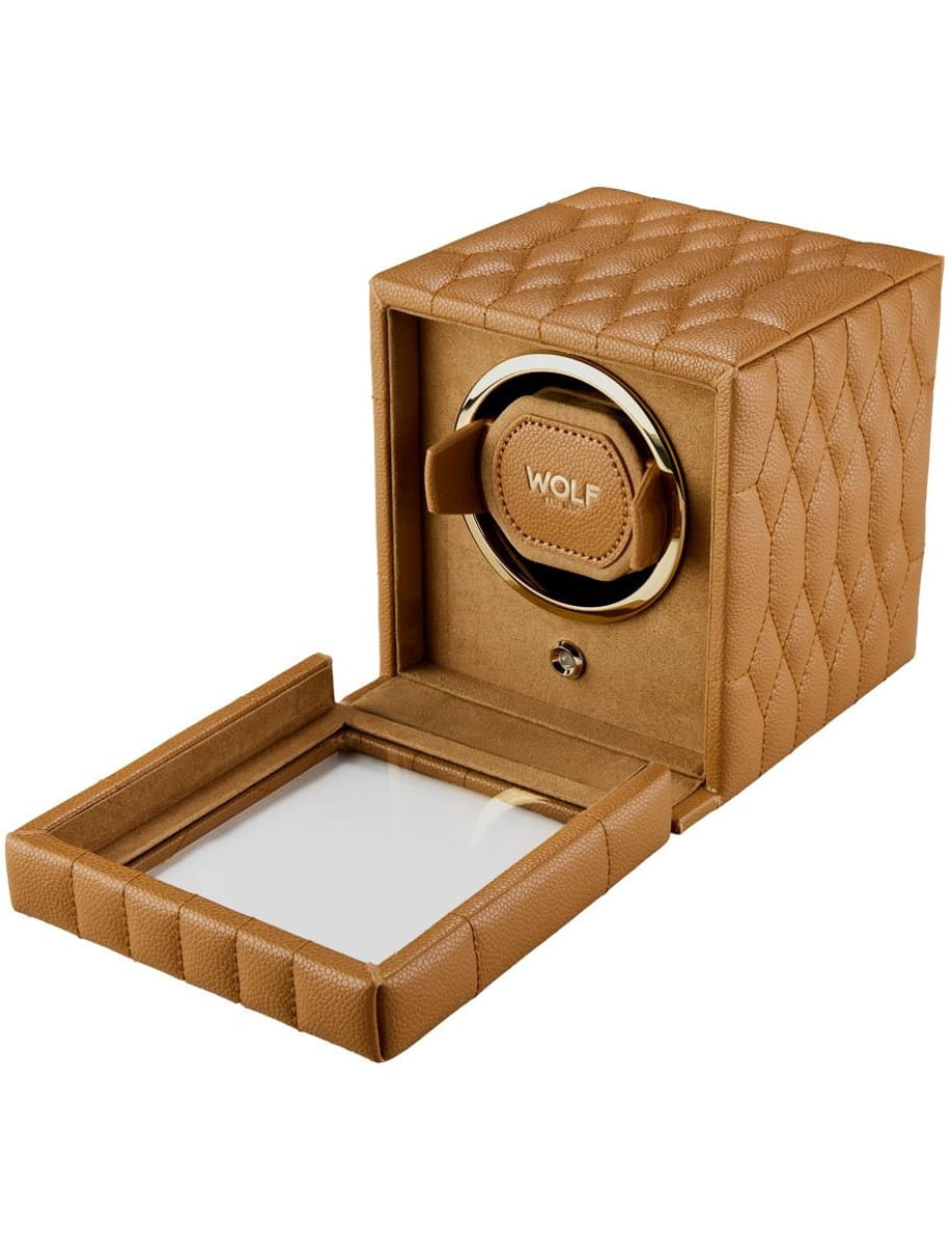 Brown quilted leather ring box with a circular gold ring holder and a pull-out mirrored tray: opens to display the ring slot inside.