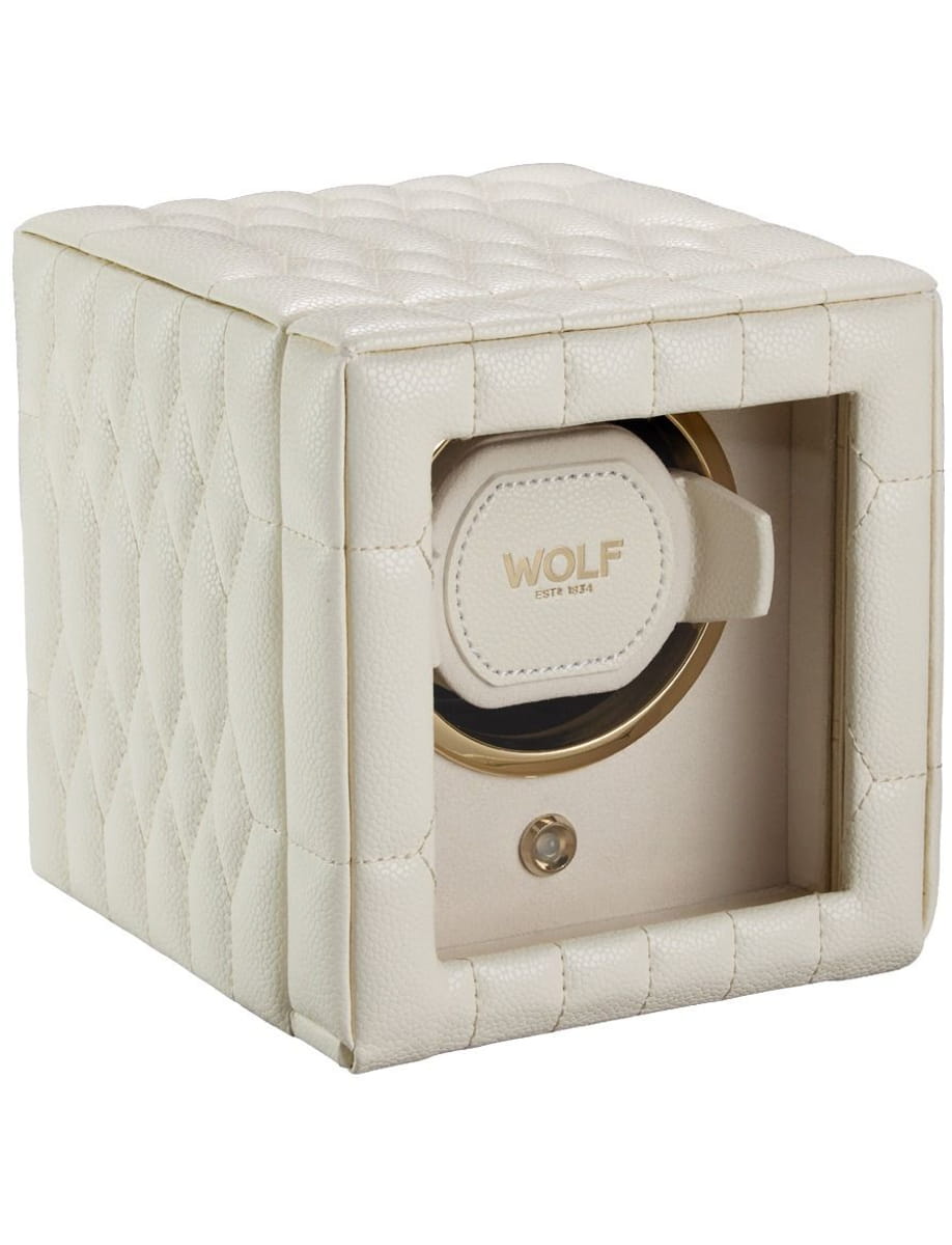 Cream quilted leather watch winder safe with gold circular interior and Wolf logo on the lid cap set into a square box.