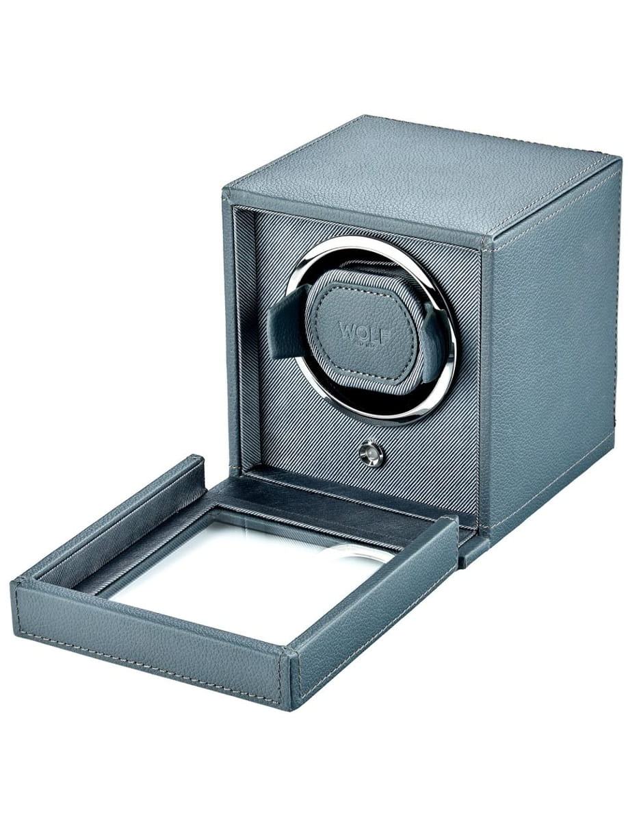 Blue leather watch winder box with circular winding rotor and a sliding pull-out drawer, empty at the moment