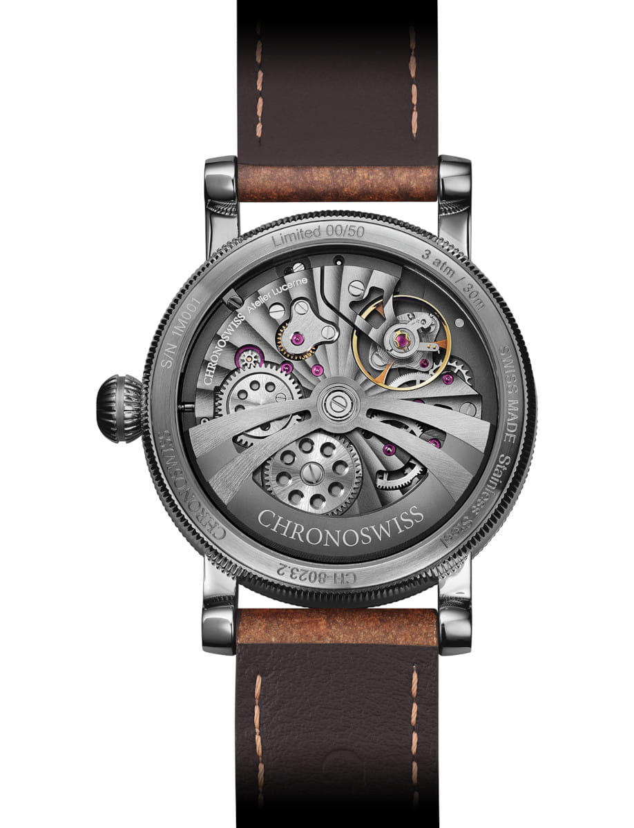 Chronoswiss watch with a transparent caseback showing the intricate mechanical movement, gears and jewels, and a brown leather strap.