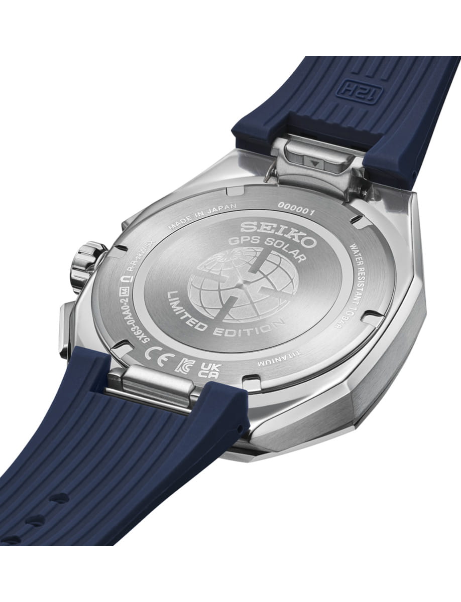 Close-up of a titanium Seiko GPS Solar Limited Edition watch back with a blue silicone strap attached