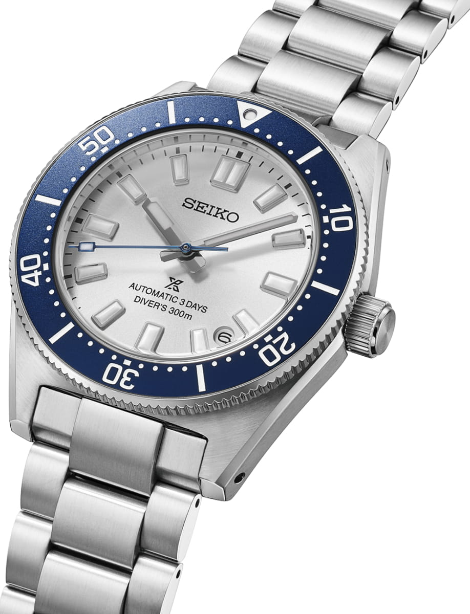 Seiko automatic diver's watch with a blue bezel and silver dial on a stainless steel bracelet (300m water resistance)