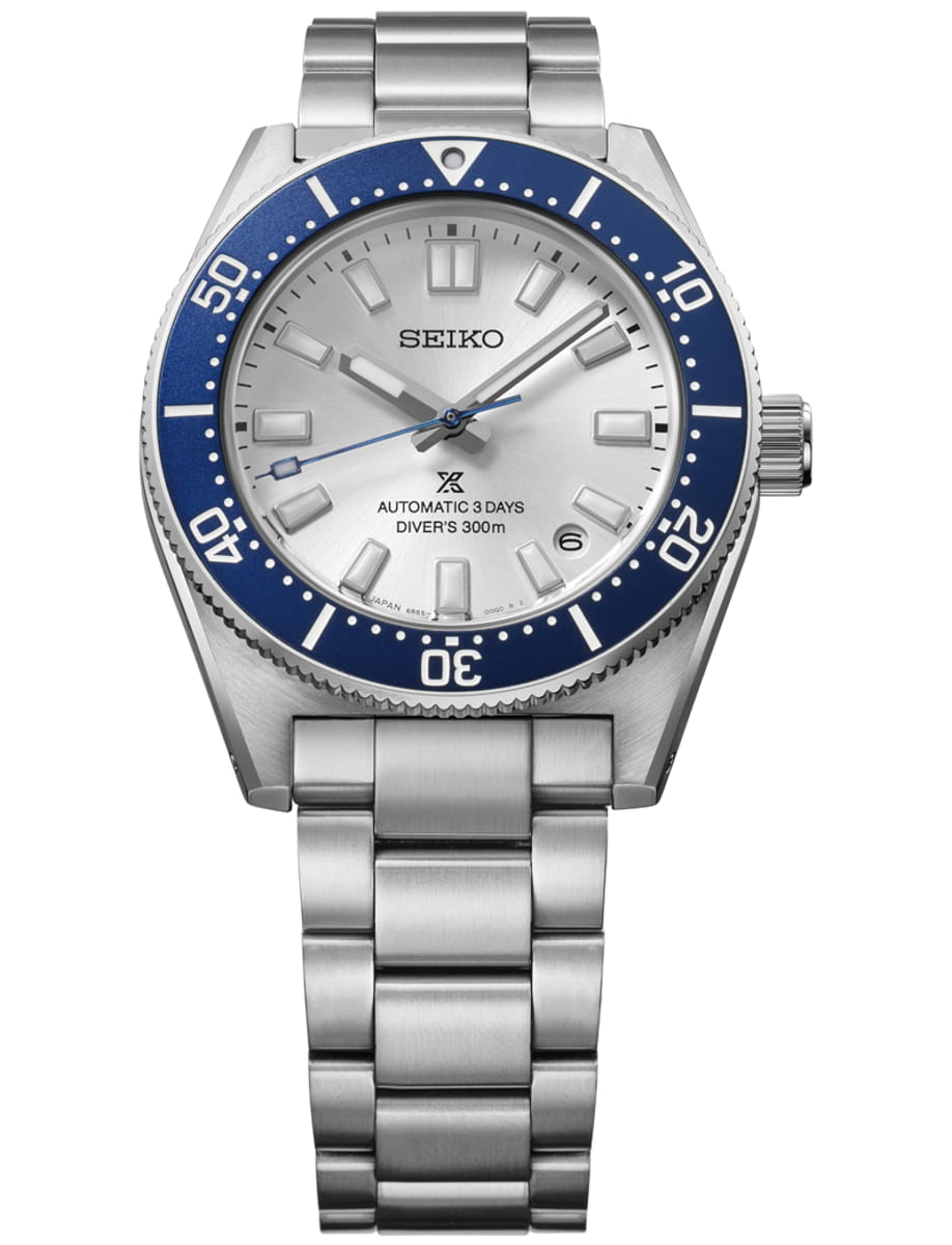 Seiko stainless steel dive watch with blue bezel, silver dial, and date window at 3 o'clock