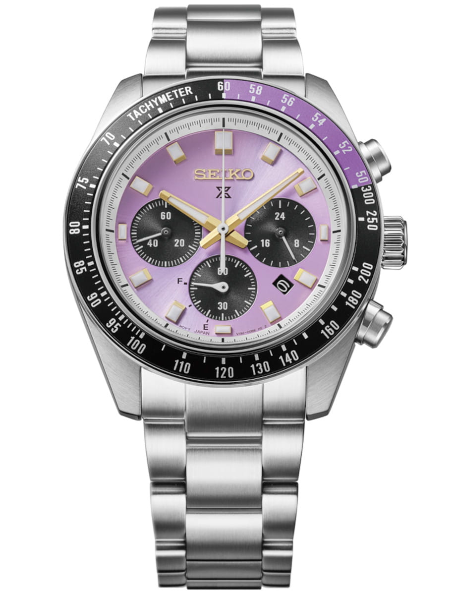 Seiko chronograph wristwatch with purple dial, three black subdials, date window, and stainless steel bracelet.