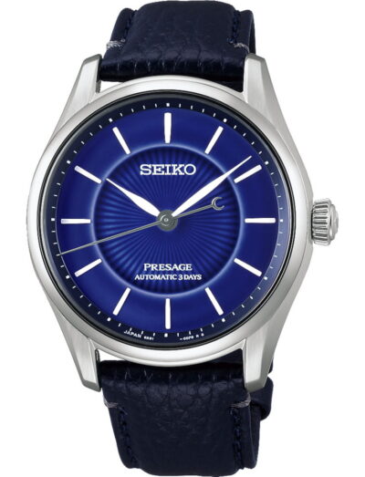 Seiko Presage automatic watch with a cobalt blue dial, stainless steel case, and cow leather strap.