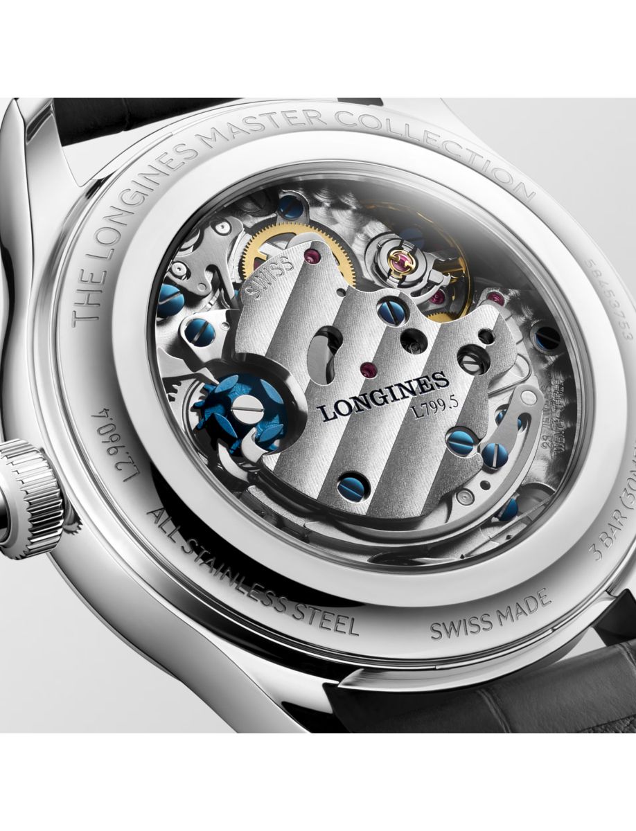 Close-up of the stainless steel back of a Longines Master Collection watch, revealing the intricate mechanical movement with blue screws and engraved LONGINES text.
