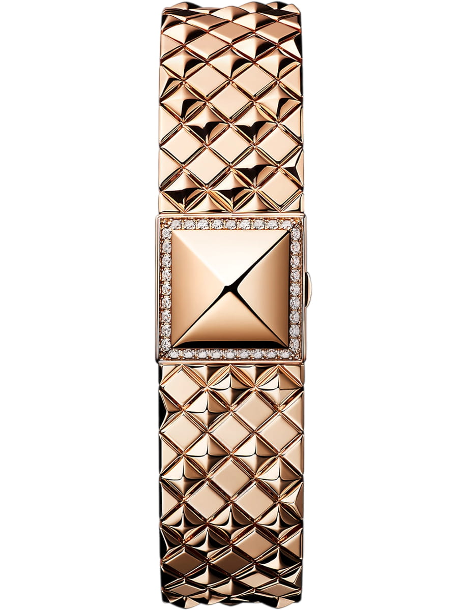 Rose gold rectangular luxury watch with a diamond-studded bezel and pyramid-pattern bracelet