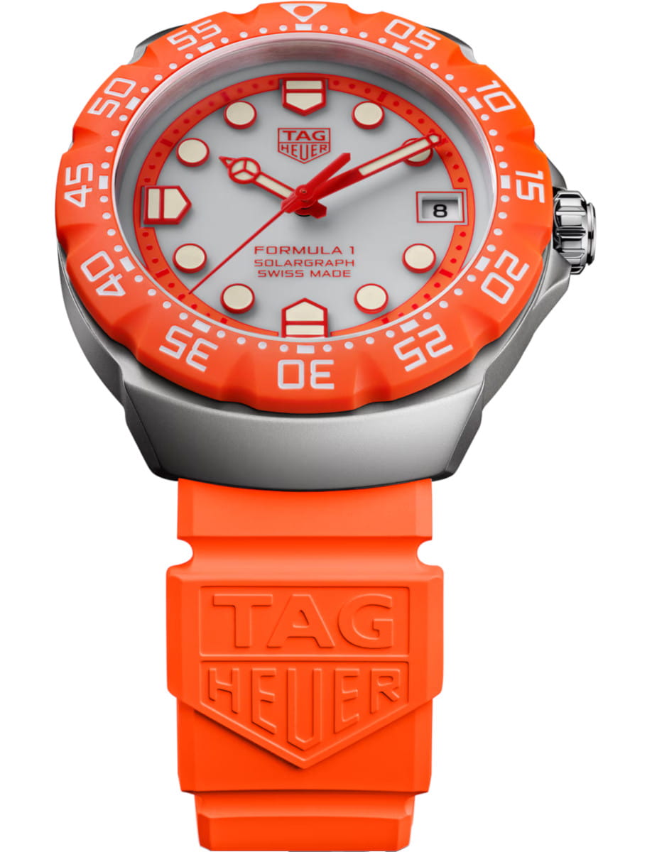 Orange TAG Heuer Formula 1 watch with a orange bezel, grey dial, and orange rubber strap featuring the TAG Heuer logo and date window at 3 o'clock.