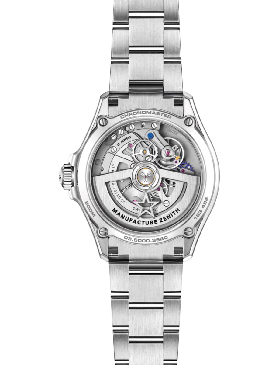 Stainless steel Zenith Chronomaster wristwatch shown from the back, with a transparent case back revealing the mechanical movement and rotor, engraved markings visible on the edge.