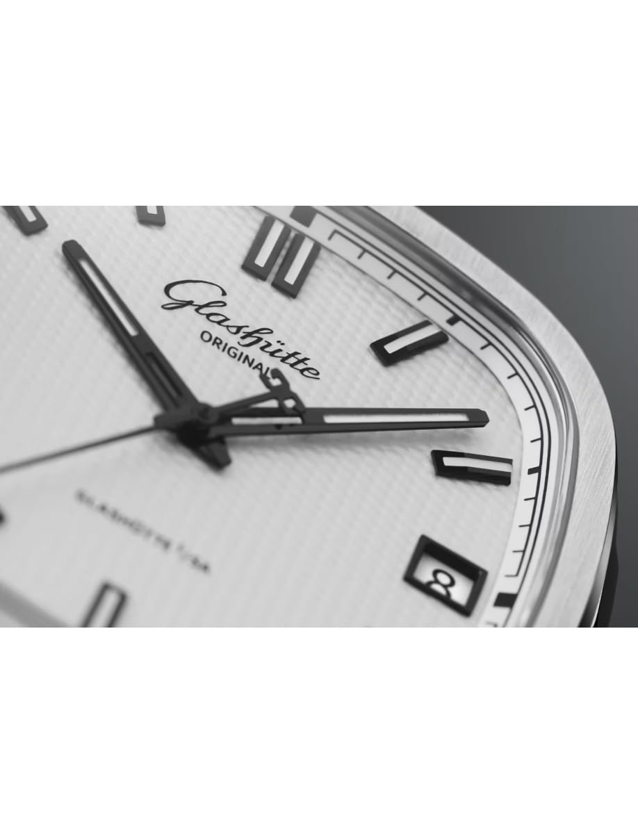 Close-up of a Glashütte Original wristwatch dial showing hands and date window at 3 o'clock.