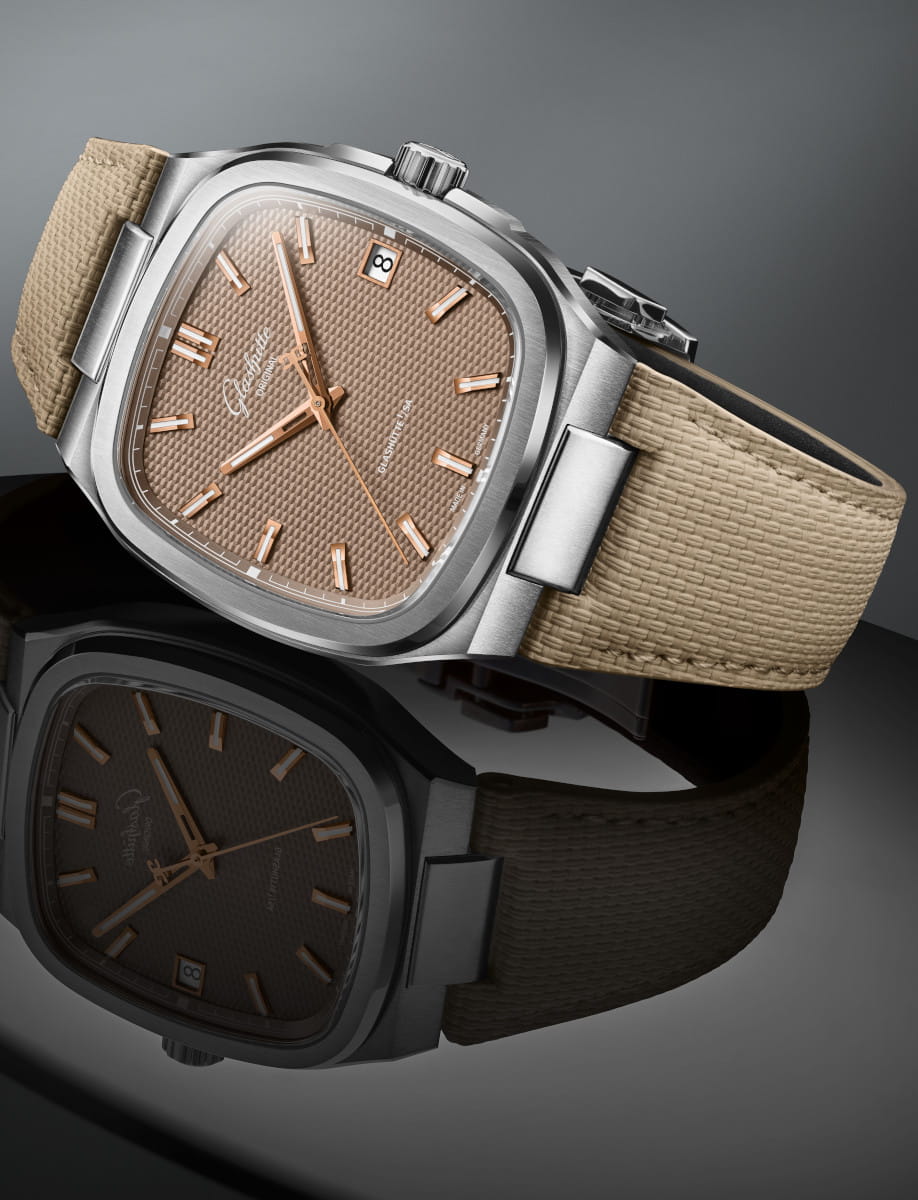 Side view of Glashütte watch with stainless steel case, beige rubber strap, brown galvanized dial, date window at 3 o'clock.
