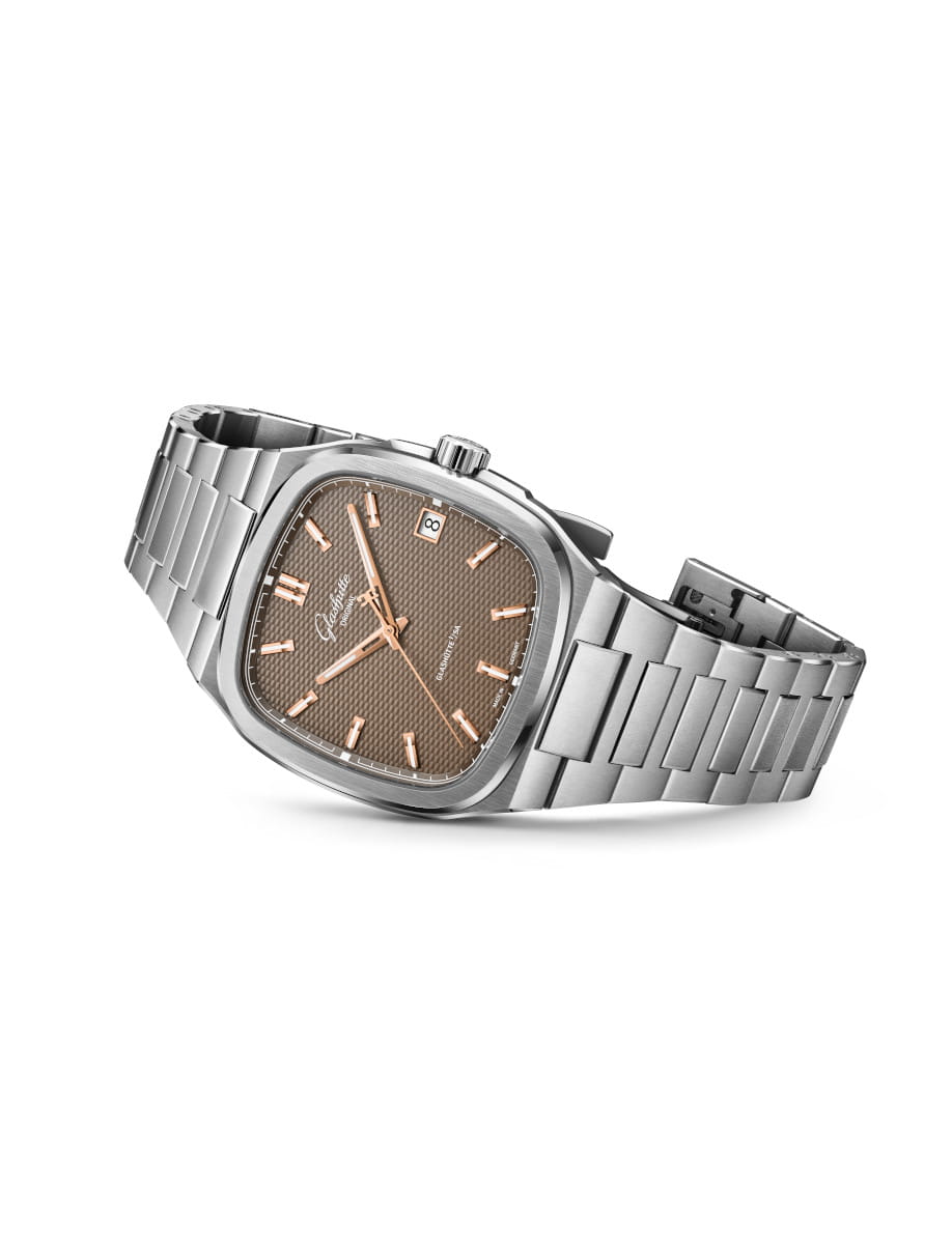 Side view of Glashütte watch with stainless steel case and bracelet, brown galvanized dial, date window at 3 o'clock.