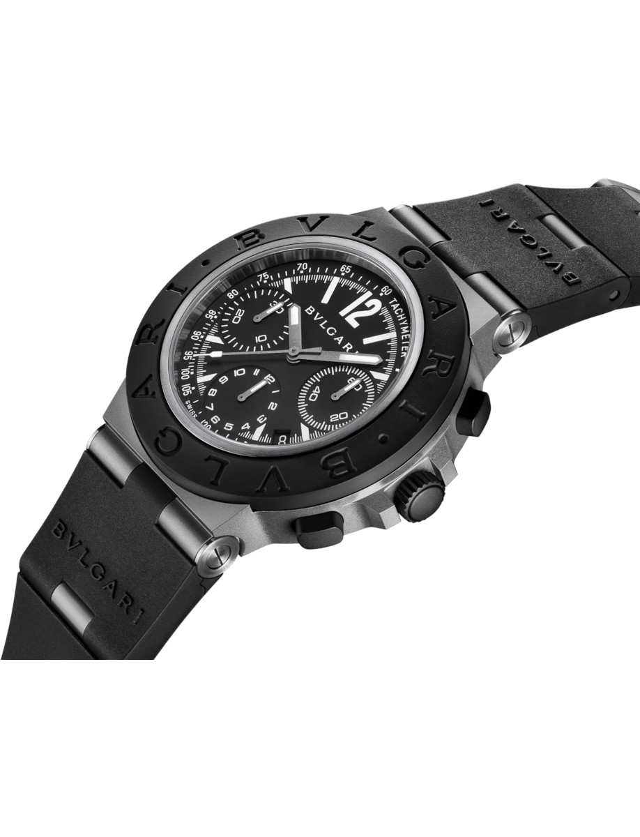 Side view of a BVLGARI chronograph wristwatch with black bezel, tachymeter scale, and rubber strap.
