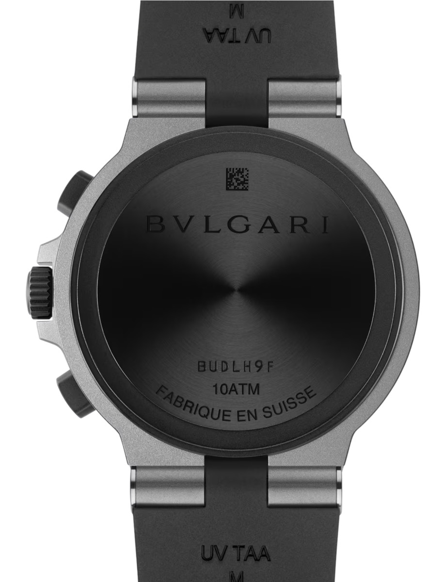 Back of a Bulgari wristwatch: brushed titanium case back with BVLGARI branding, water resistance 10 ATM, model code BUDLH9F, made in Switzerland, attached to a black strap.