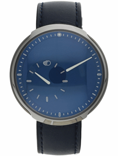 Pre-owned Ressence wristwatch with a dark blue leather strap and minimalist dial details, grade 5 titanium case.