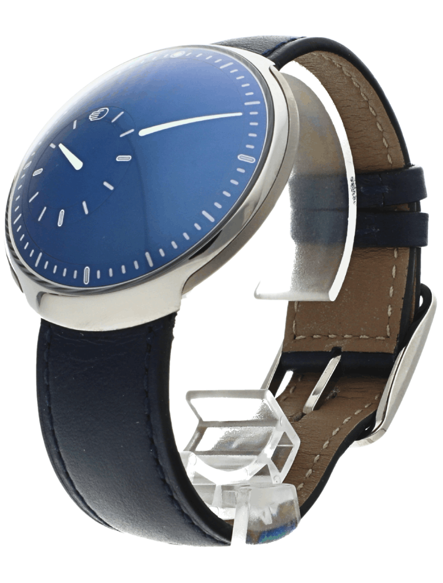 Blue-faced wristwatch with a dark leather strap and silver case, shown at an angled side view.