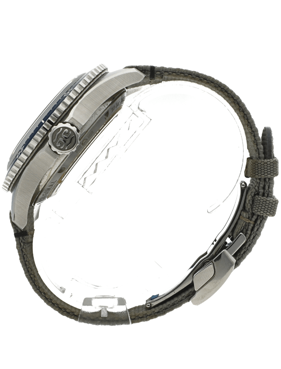 Side view of a metal wristwatch with a rugged gray cord strap.