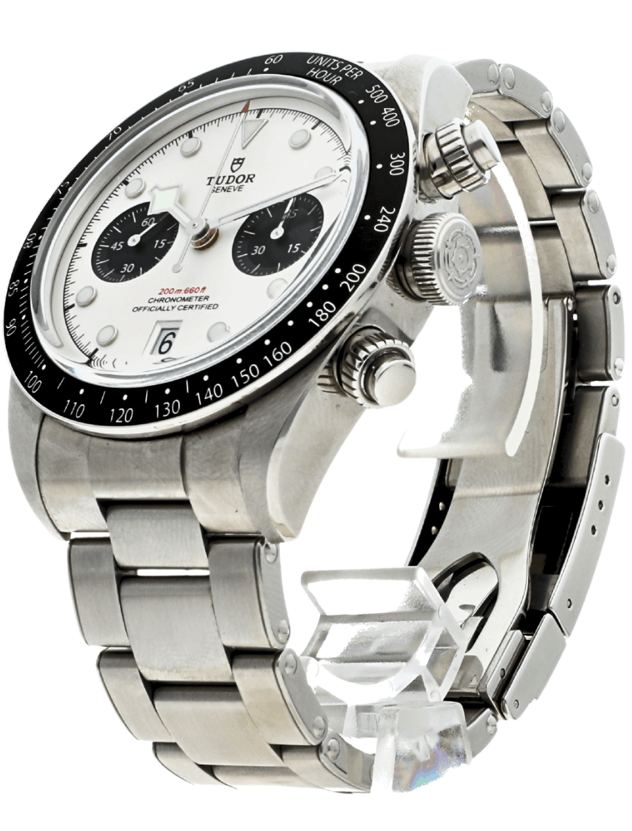 Left side view of Pre-owned Tudor wristwatch with stainless steel case and bracelet, and opaline and black dial.