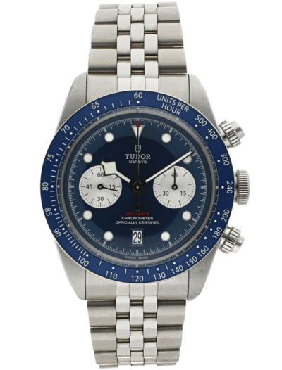 Stainless steel Tudor chronograph watch with a blue dial, white subdials, and a metal bracelet.