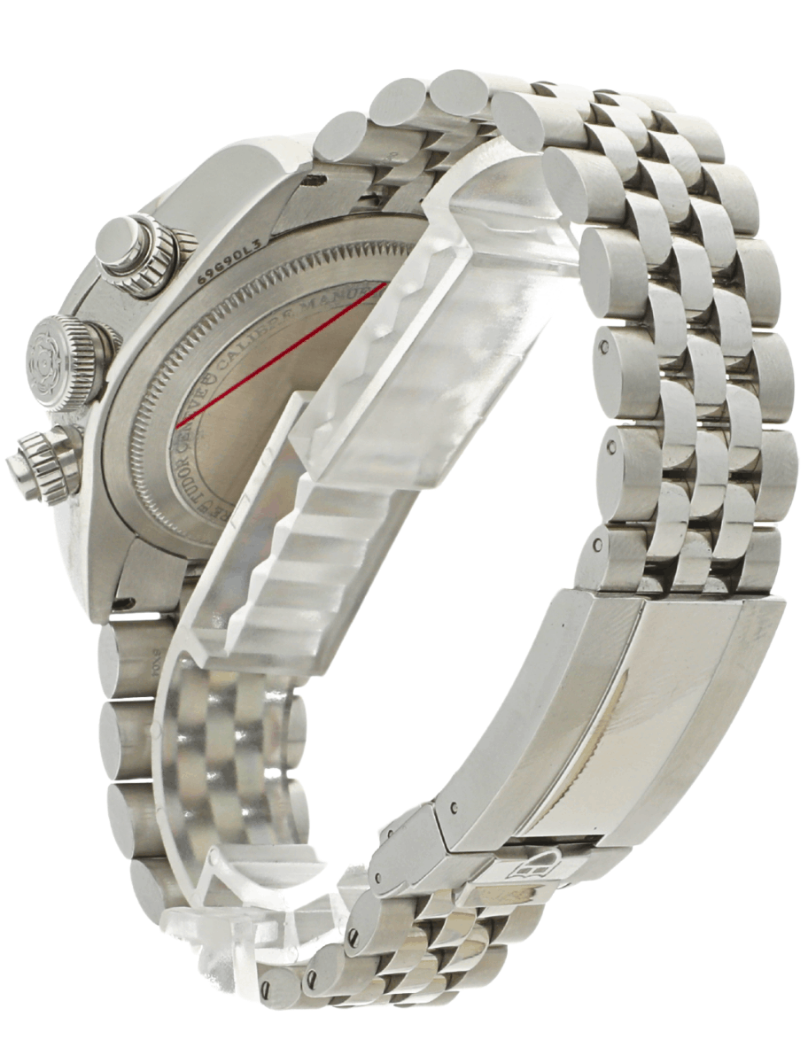 Side view of a stainless steel wristwatch with a multi-link bracelet, showing the back case and crown.