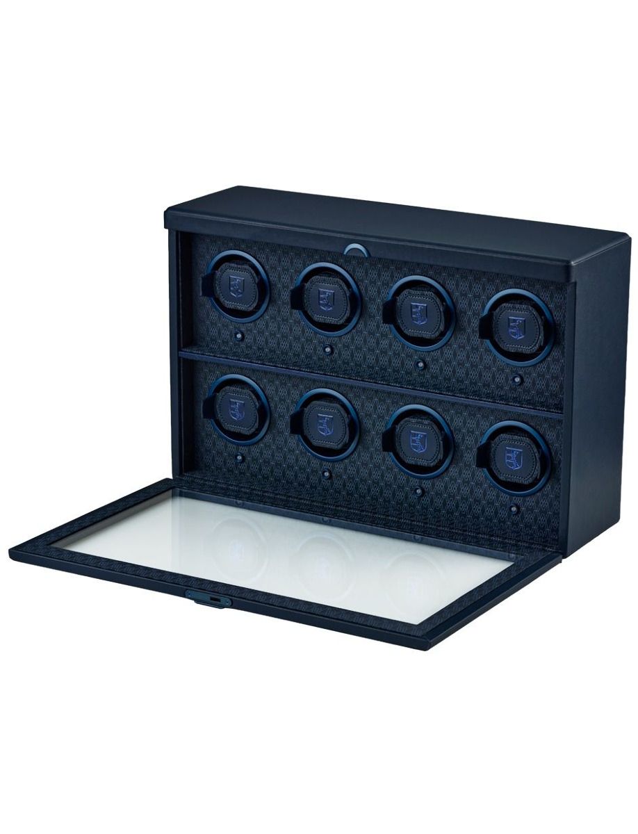 Blue display watch winder case with eight circular winders and a glass-front lid open, designed to keep automatic watches wound and ready to wear