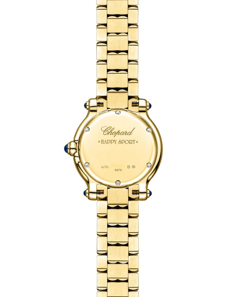 Gold Chopard Happy Sport watch shown from the back with a diamond-studded case and blue cabochon crown.