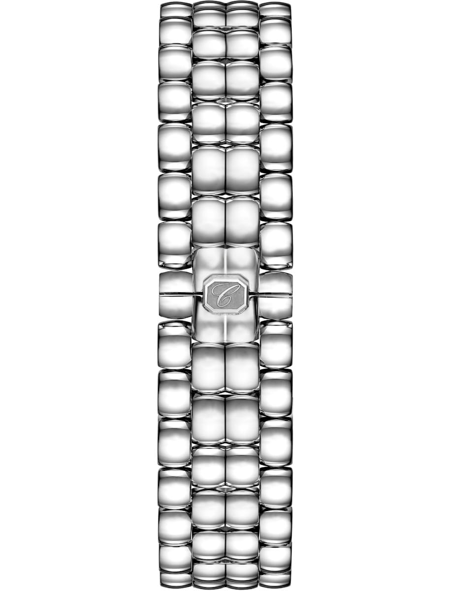 Close-up of a stainless steel metal link bracelet with a square clasp bearing a decorative 'C' emblem.