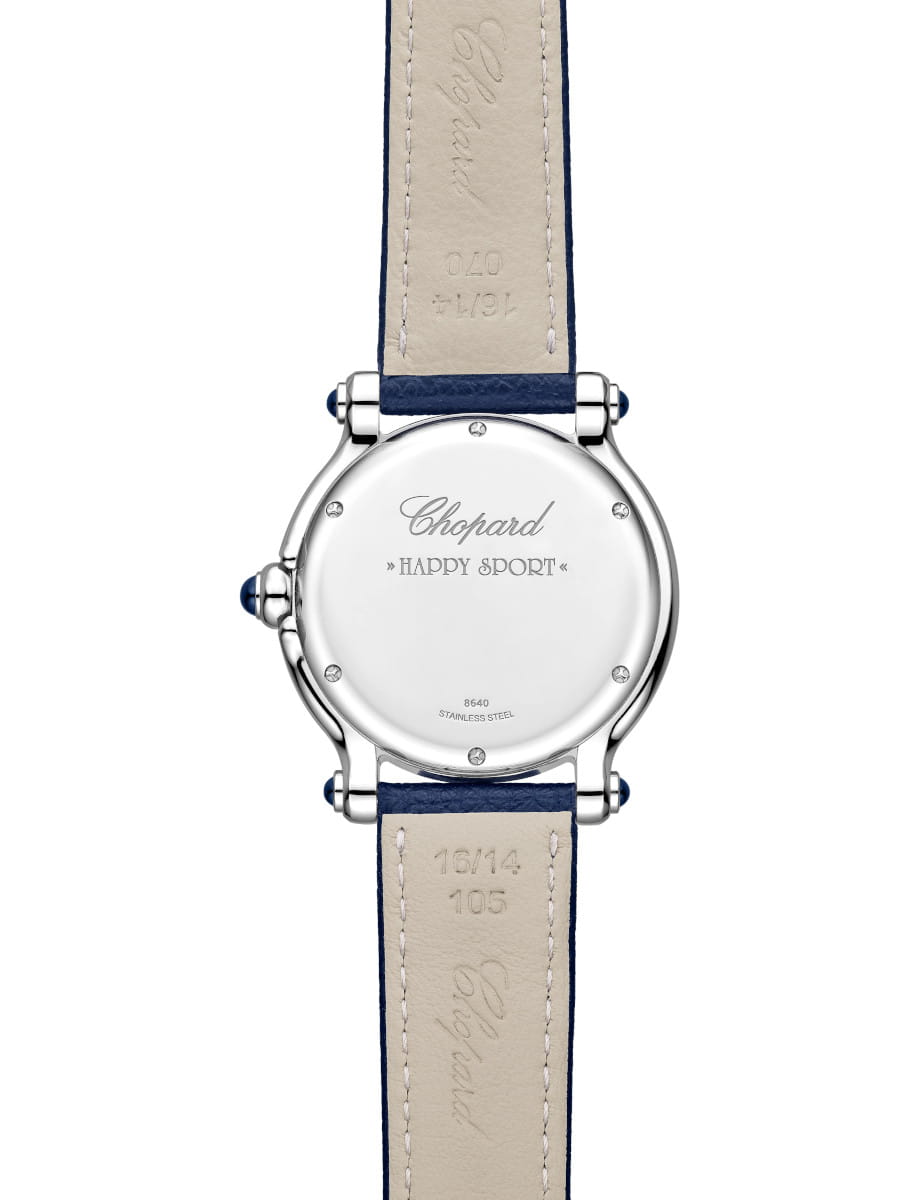 Back of a stainless steel Chopard Happy Sport watch showing engraved brand and model on the case back with a blue leather strap.