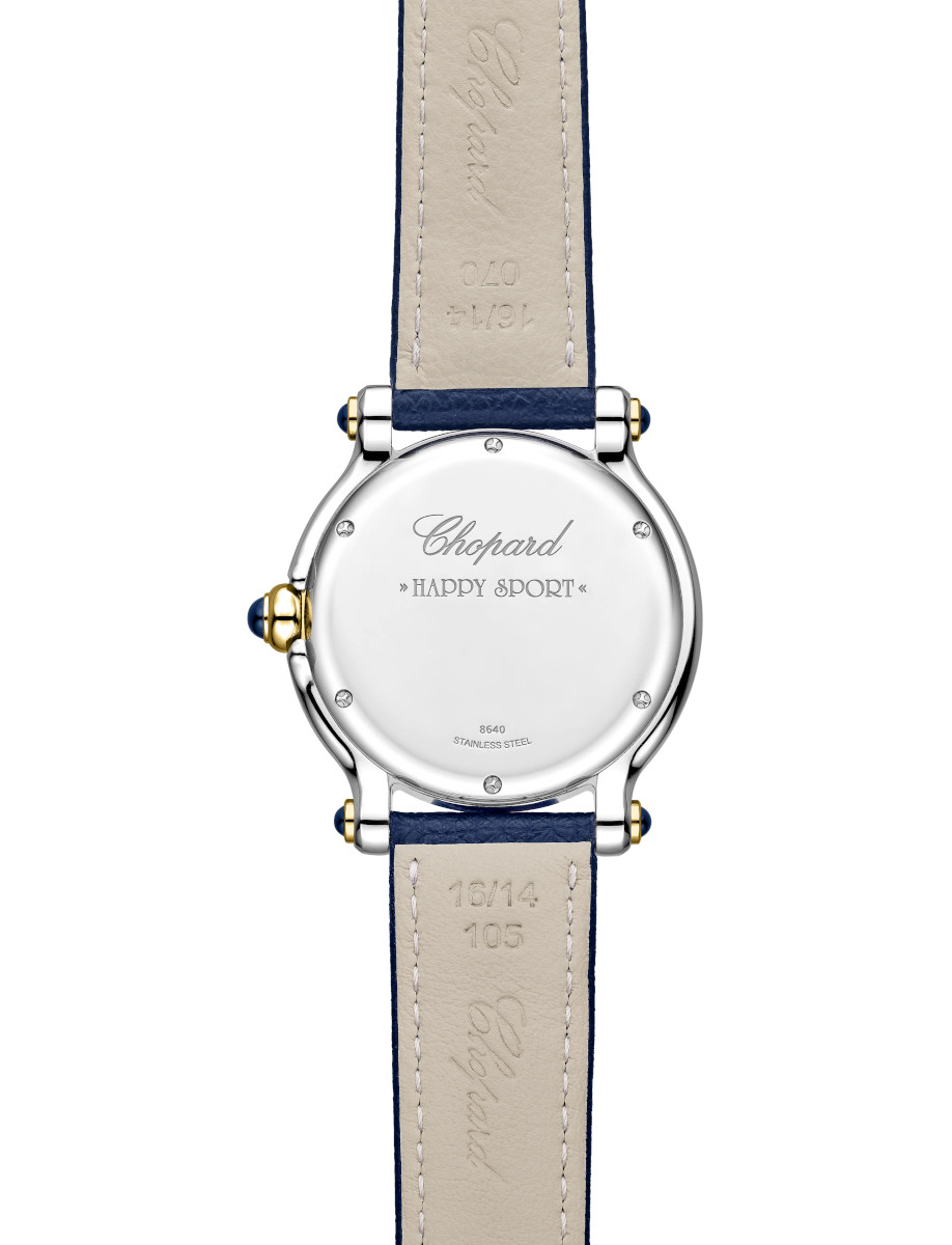 Back of a stainless steel Chopard Happy Sport watch showing engraved brand and model on the case back with a blue leather strap.