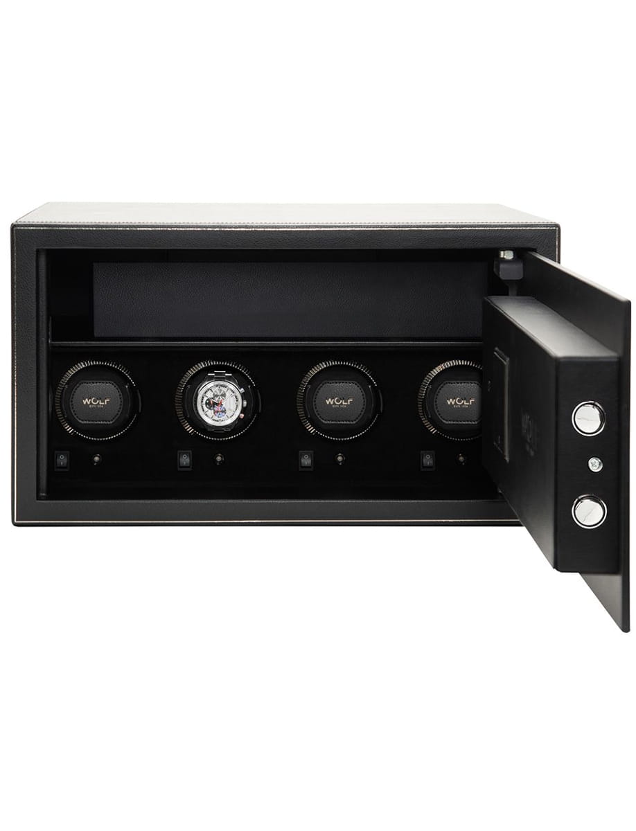 Open black safe with a row of four watch winders inside, showing three labeled WOLF and one empty slot; door slightly ajar on the right.