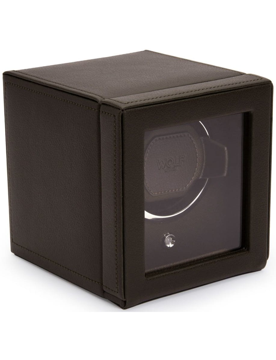 Brown leather watch winder case with a clear front panel showing a watch inside.