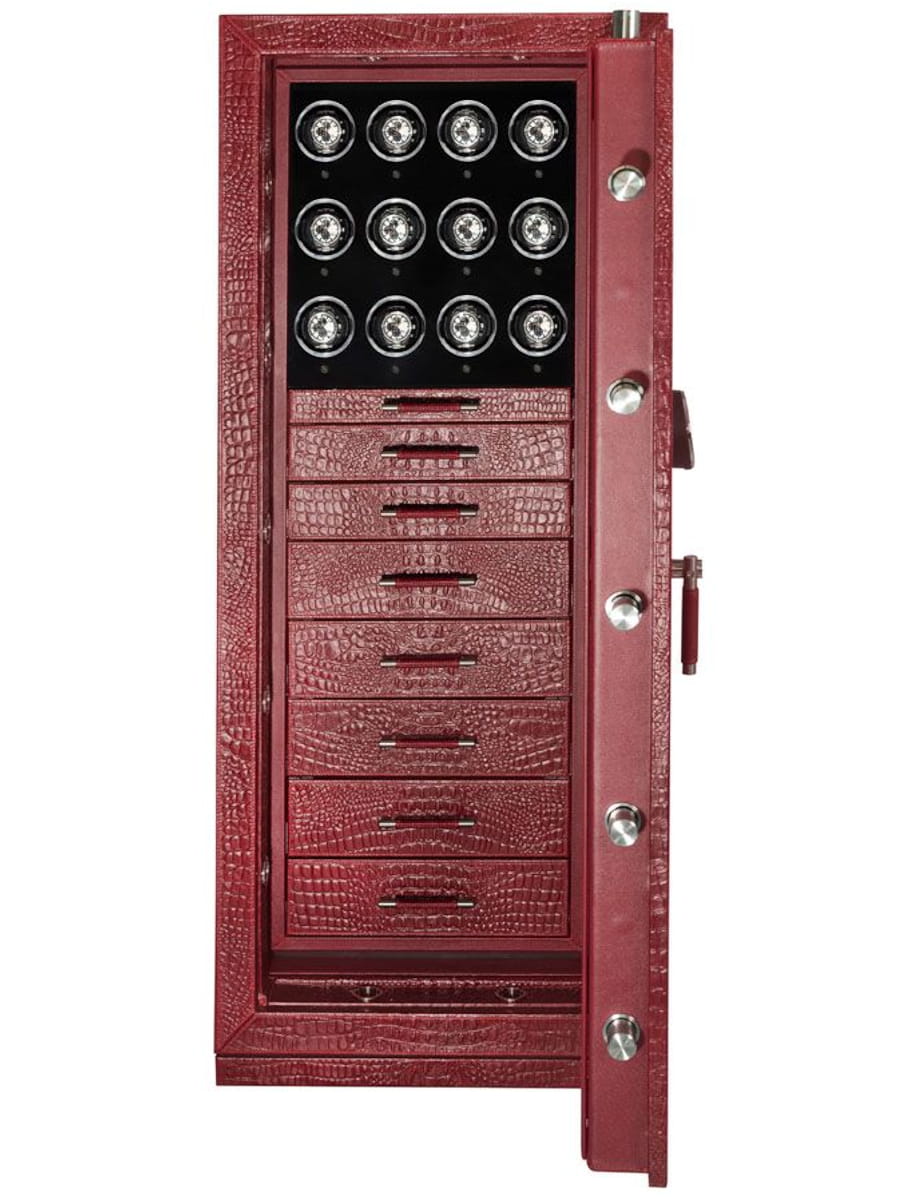 Red tall safe with open door, revealing many small drawers and a black interior with circular locks at the top edge of the interior panel.