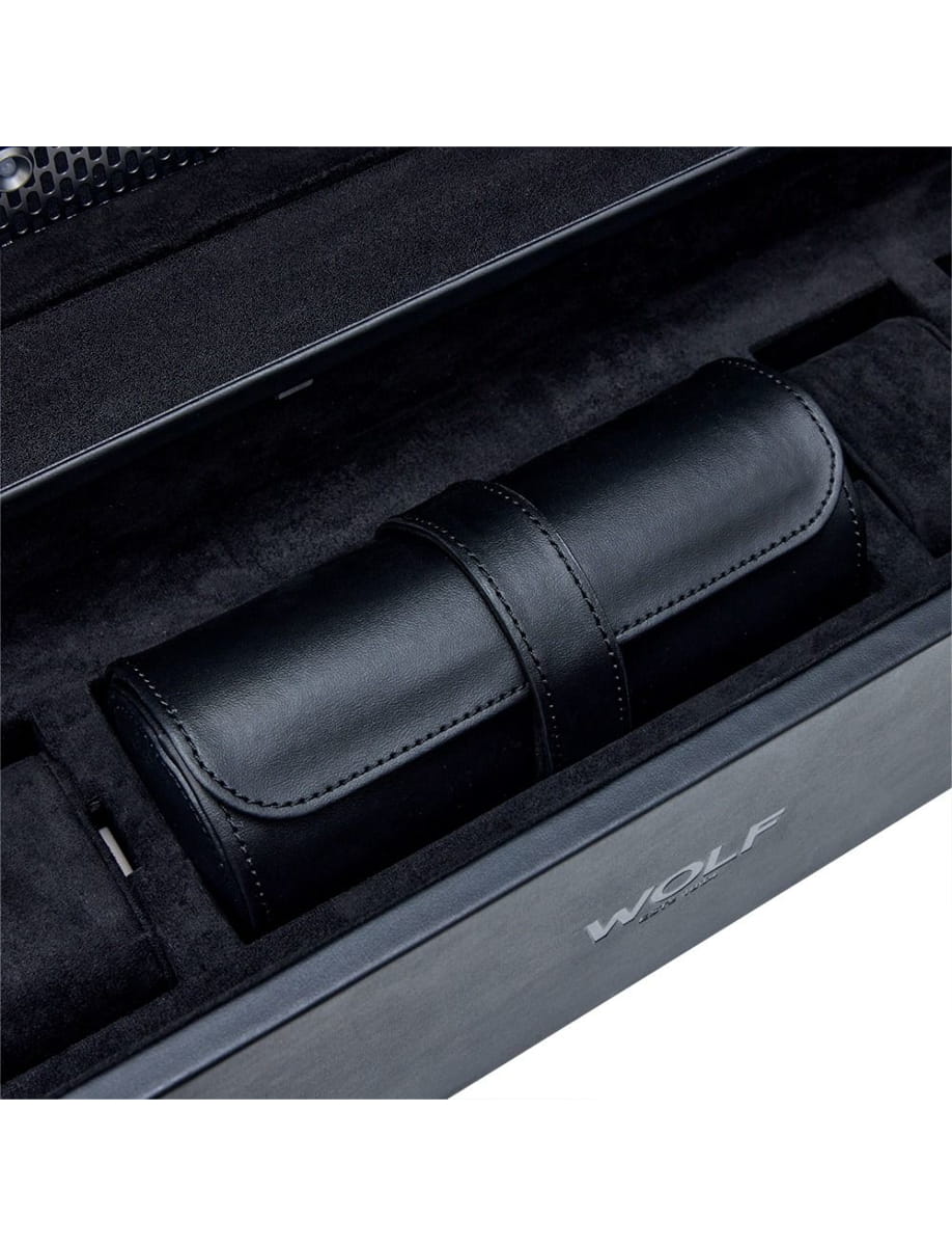 Black leather cylindrical case with a strap, inside a suede-lined display box.