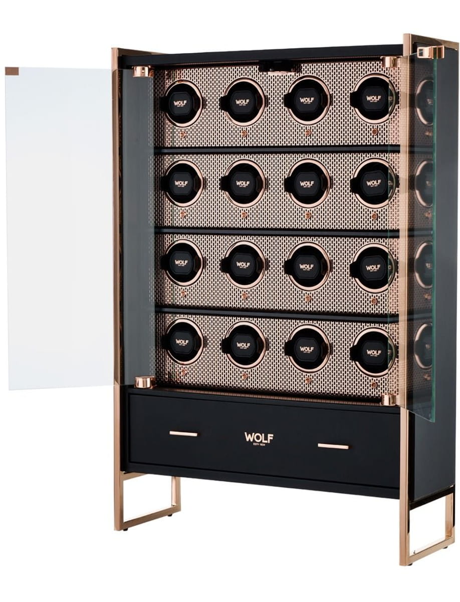 Glass-front watch winder with multiple watch racks and Wolf branding on the circular units inside a stainless frame.