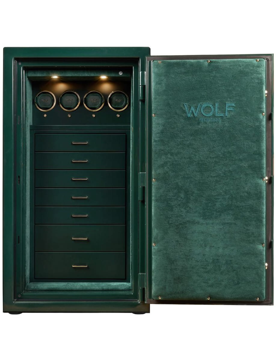 Green Wolf safe with door open, interior shows seven drawers beneath a row of circular dials at the top.