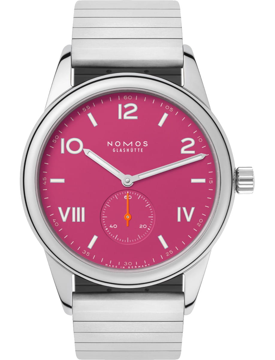 NOMOS Glashütte wristwatch with a pink dial, white hour markers, and a small orange seconds subdial at 6 o'clock on a sport bracelet.
