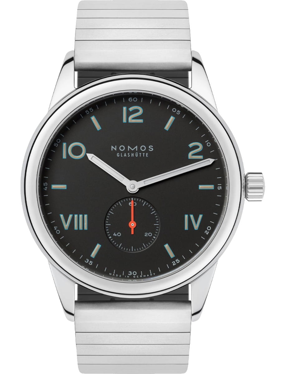 Nomos wristwatch with stainless steel case, sport bracelet, and black dial.