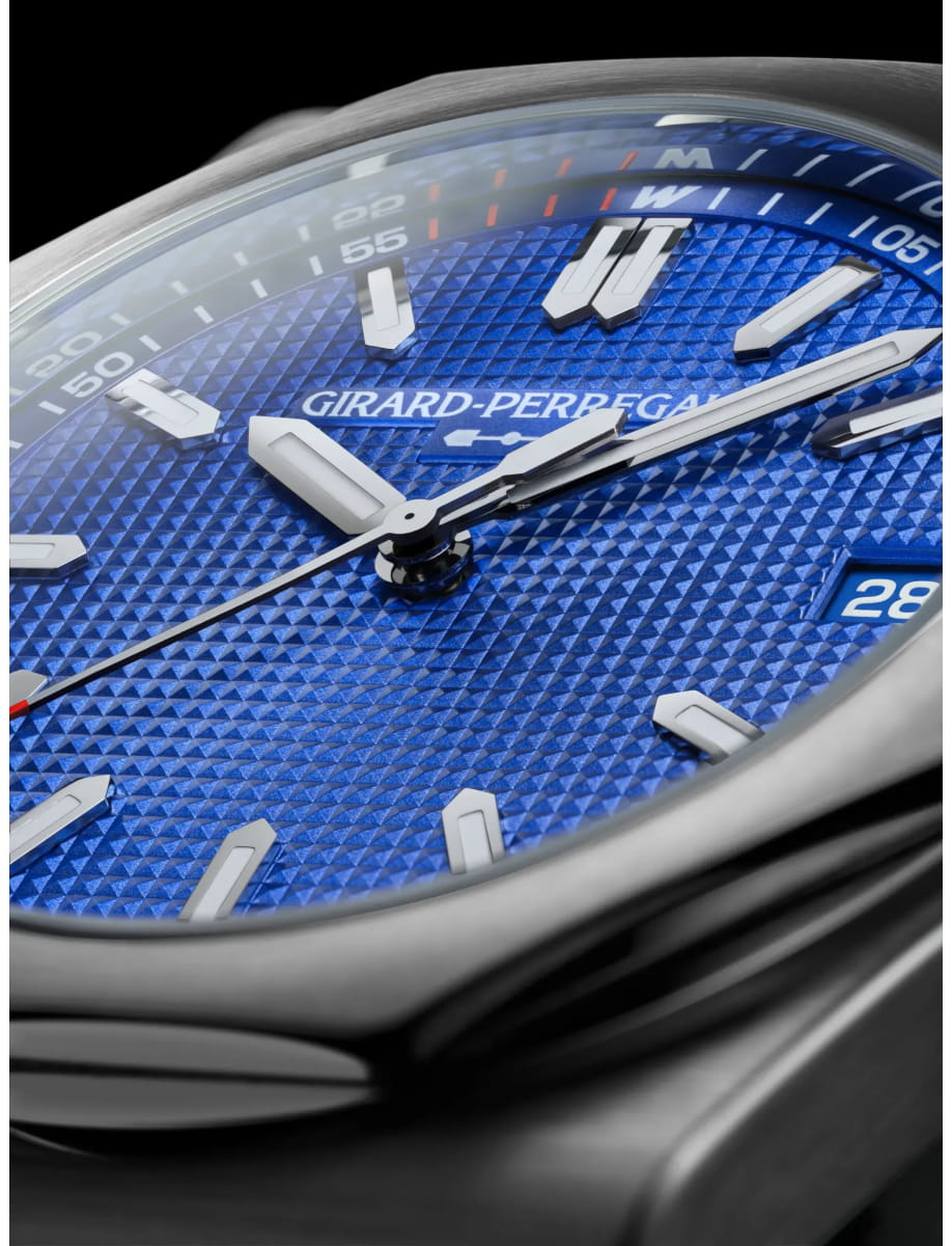 Close-up of a blue textured watch dial