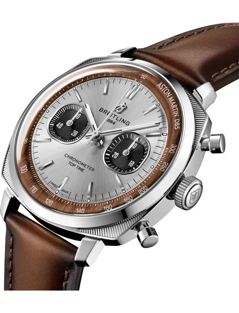 Breitling chronometer Top Time watch with silver dial, brown bezel, and brown leather strap.