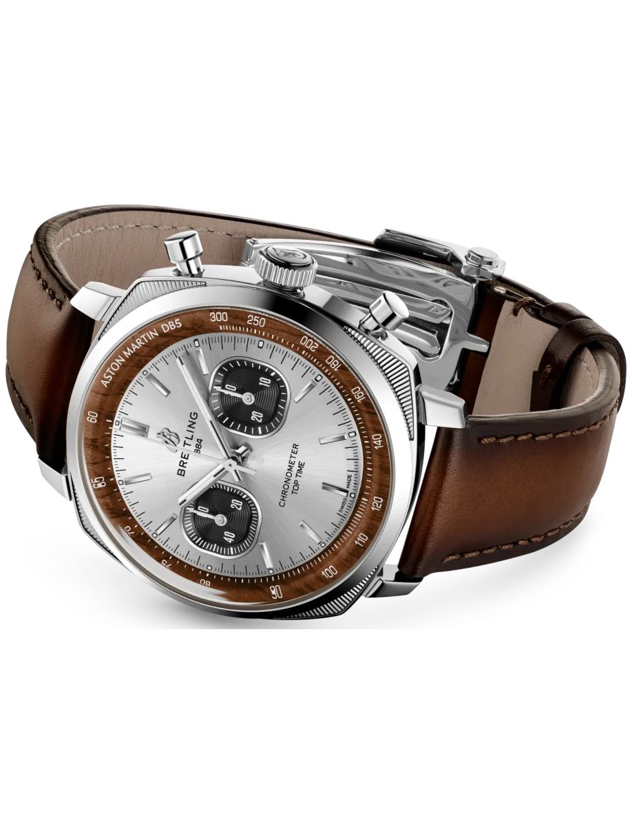Breitling chronograph wristwatch with a silver dial, brown bezel, and brown leather strap.