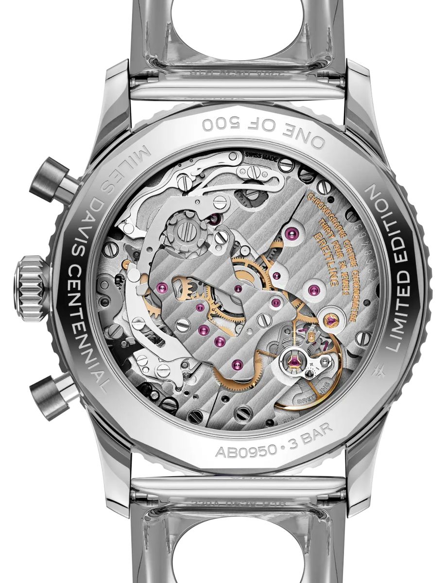 Back view of a stainless steel limited-edition chronograph watch, showing the intricate mechanical movement with gears and ruby jewels visible through a transparent caseback.