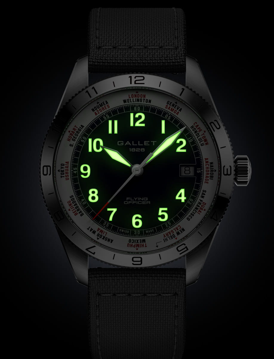 Gallet Flying Officer wristwatch with glowing green numerals and date window, fabric strap.