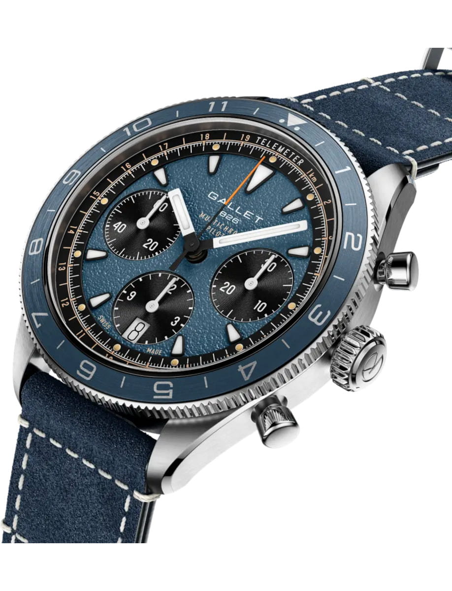Blue dial chronograph Gallet wristwatch with black subdials and blue bezel on a suede strap.