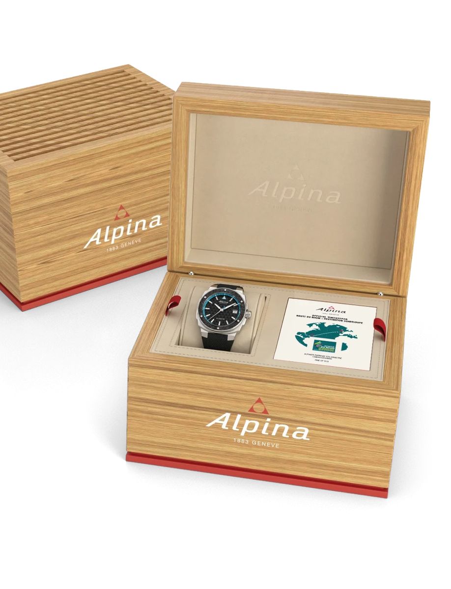 Alpina wristwatch in an open wooden presentation box with the brand name on the exterior and an inner card beside the watch