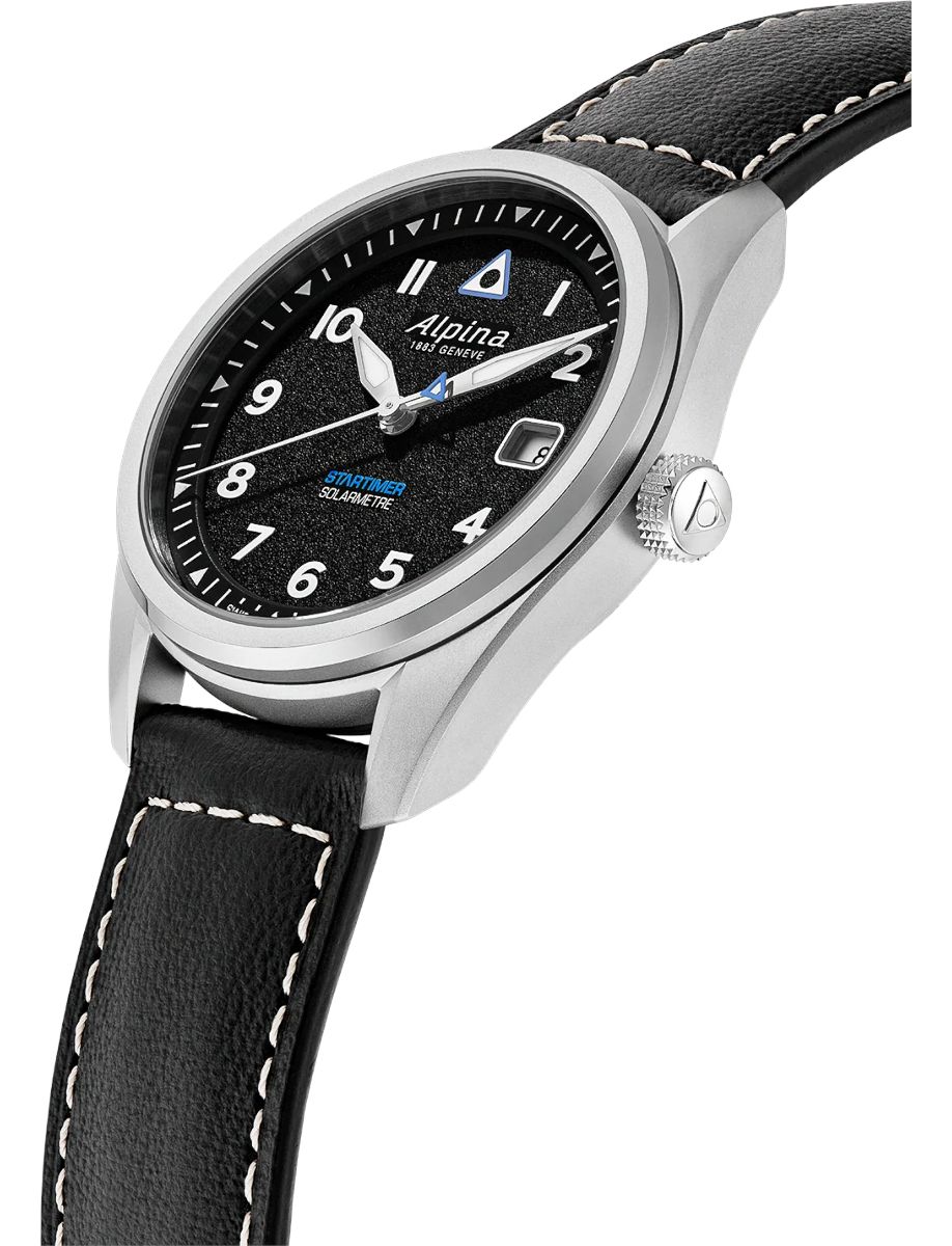 Alpina Startimer wristwatch with a black dial, silver case, and black leather strap showing date window and white numerals.