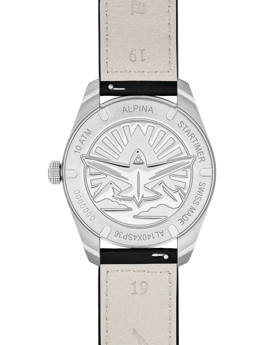 Stainless steel watch back with an embossed airplane logo, Swiss Made and STARTIMER markings, leather strap attachment at top and bottom.